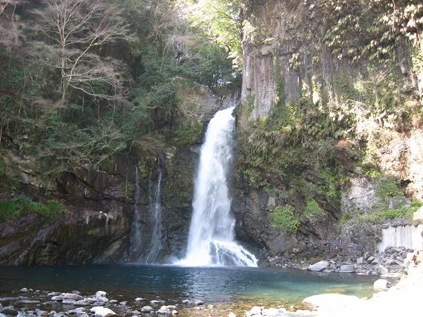 Odaru waterfall and its pool framed by forest, photographed in March 2008